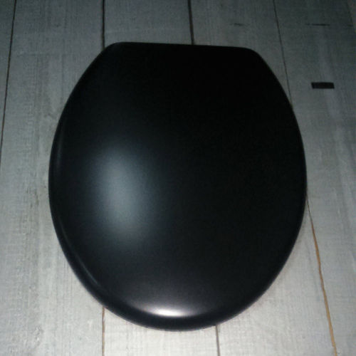 Tapa + asiento inodoro en resina modelo Fly serie Fly, acabado en negro mate.
