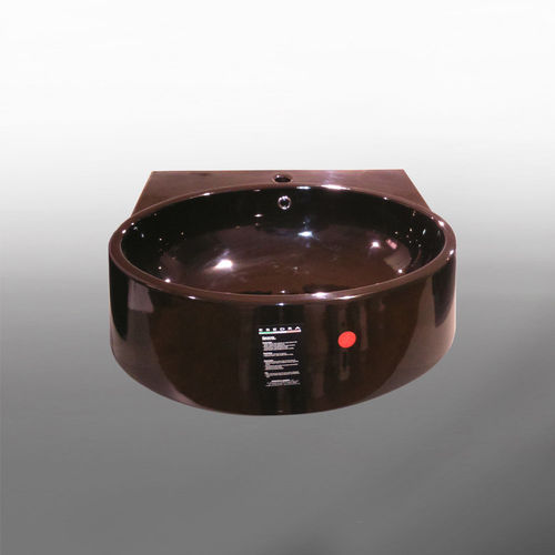 Lavabo oval de medidas 70x54 h.22 cm,  instalable suspendido o sobre encimera modelo Flat Wall serie